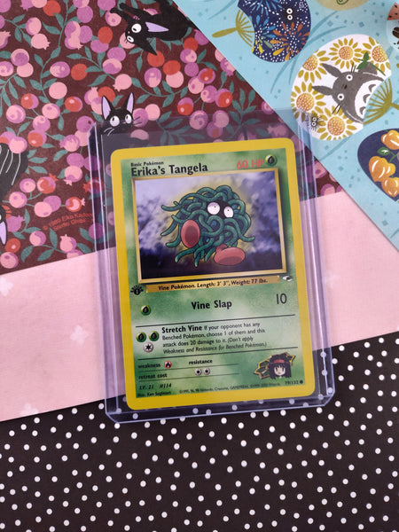 Vintage Common - 1st Edition Erika's Tangela Gym Heroes Non-Holo Pokemon Card 79/132 - NM Vintage Common - 1st Edition Erika's Tangela Gym Heroes Non-Holo Pokemon Card 79/132 - NM