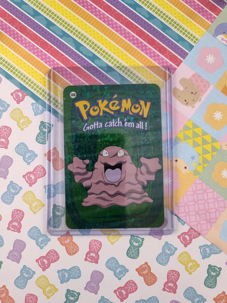 Vintage 1990's Pokemon Trading Vending Prism Shiny Holo Sticker Grimer #88 - NM