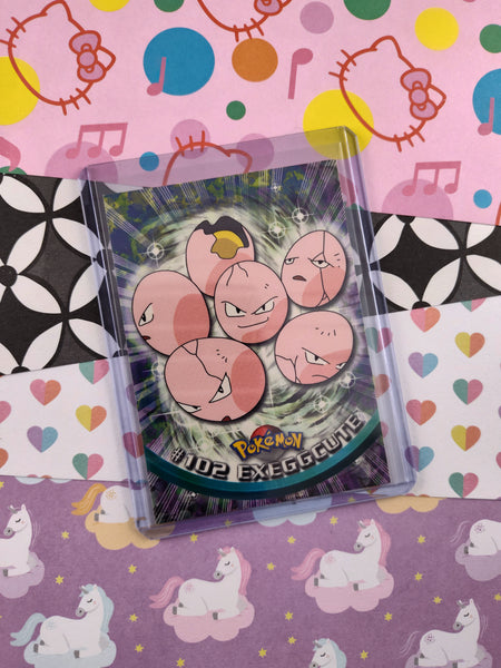 Vintage 1998 Topps 1st Edition Blue Label TV Animation Edition #102 Exeggcute Non-Holo Pokemon Card - NM