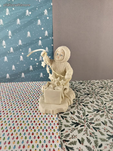 Vintage Snowbabies Department 56 Wintery Seasonal Stringing Fallen Stars Figurine