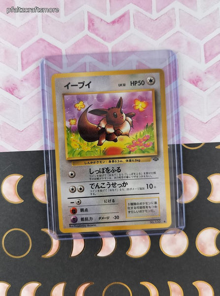 Vintage Common (Japanese) - Eevee Team Rocket Pokemon Card #133 - NM