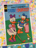 Vintage Walt Disney Daisy and Donald December 1975 #14 Whitman Comic, GD - VG w/Bag & Board