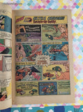 Vintage Walt Disney Uncle Scrooge December 1975 #124 Whitman Comic, GD - VG w/Bag & Board