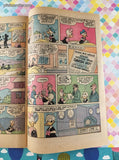 Vintage Walt Disney Daisy and Donald December 1975 #14 Whitman Comic, GD - VG w/Bag & Board